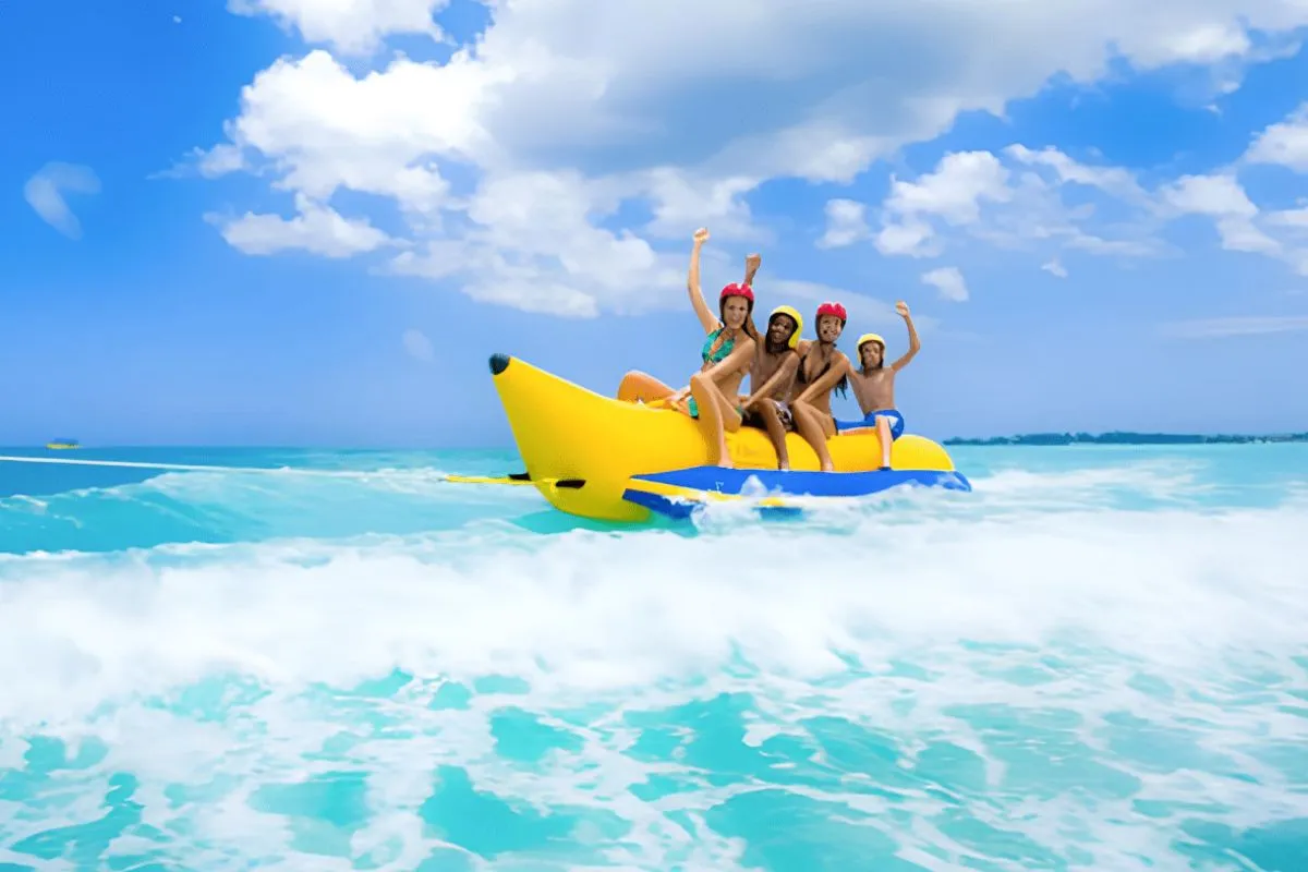 Banana boat ride Abu Dhabi group fun with life jackets and sea views