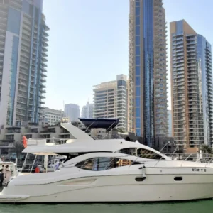 55 ft Majesty yacht cruising in Dubai Marina skyline