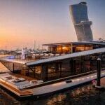 Exterior sunset view of the Luxury Houseboat Miss Kim at the marina