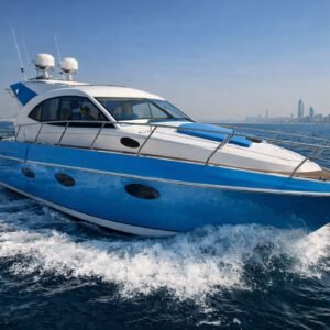 Sleek blue and white Luxury Yacht Panda 1 cruising in the sea