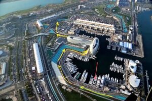 Aerial view of Yas Marina Circuit in Abu Dhabi and the surrounding marina with the yacht access route highlighted